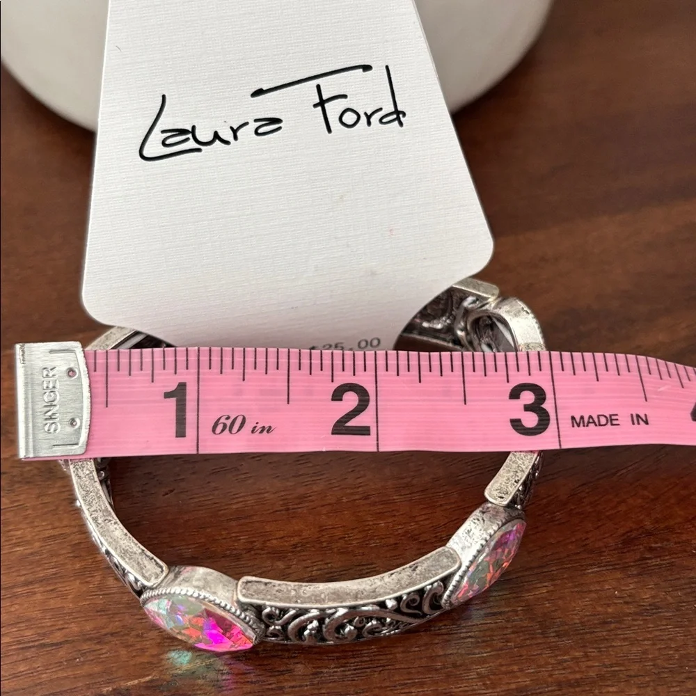 Laura Firs Stretch Embossed Silvertone w/iridescent beveled stones,stretch